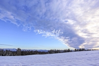 Winter Scene: Stratus clouds at sunset in the Bavarian Highlands