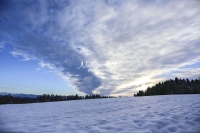 Winter Scene: Stratus clouds at sunset in the Bavarian Highlands